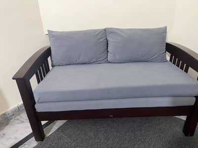 2 seater wooden sofa