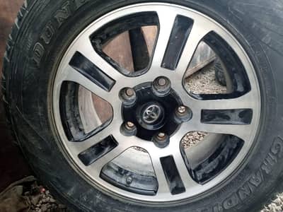 Toyota Genuine Alloy Rim with Dunlop Tyre – Good Condition