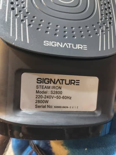signature steam iron