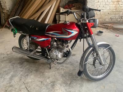 honda 125 red clout in good condition