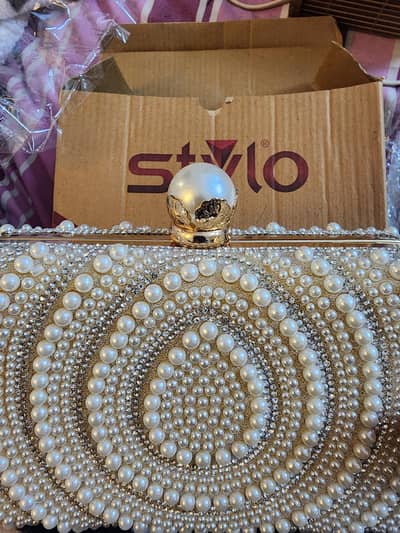 Clutches Diamondes and Pearls, New.