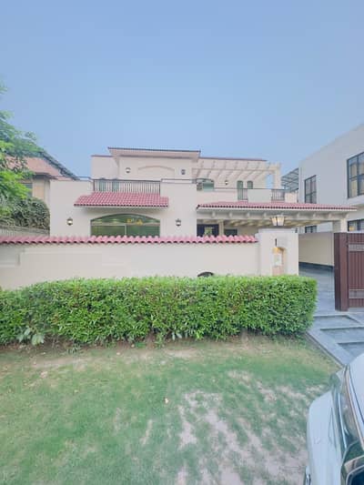 One Kanal Used Spanish Design Bungalow For Sale At Prime Location Of DHA Lahore Near To Park Masjid & Commercial Market.