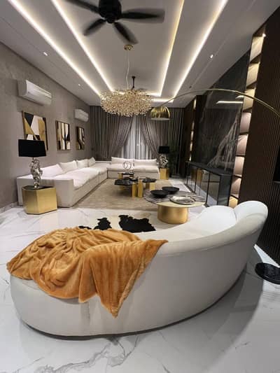 FULLY FURNISHED WITH IMPORTED FURNITURE 26.25 MARLA ELEGANT AND SUPER HOT LOCATED BUNGALOW WITH SOLAR INSTALLED IS AVAILABLE IN THE BEST BLOCK OF DHA LAHORE.