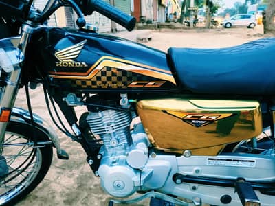 0325-5561104     Honda special edition gold 2024