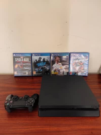 PS4 Slim 1TB Used with 4  Games with original controller