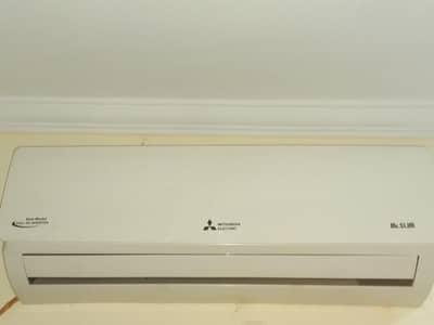 Mitsubishi 1.5 Ton Split AC (Heat & Cool) – Good Condition.  10 by 10.