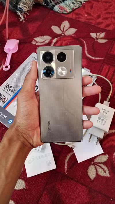 infinix note 40 with box charger contact 03100044654