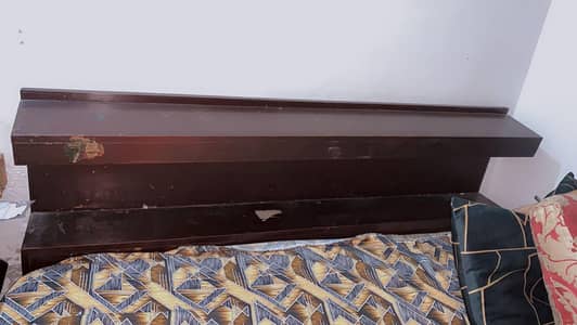 solid wooden king bed with storage slightly used for sale