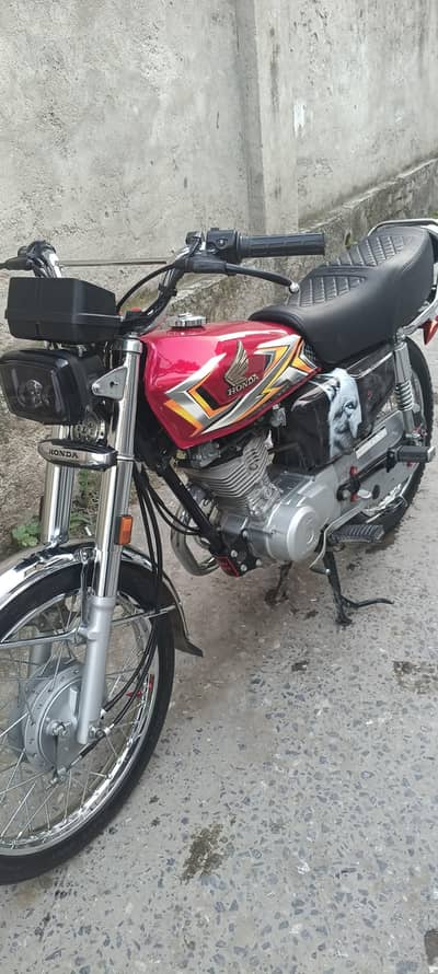 Honda 125.   double saman  full lash pash. lighting lagi huai hai