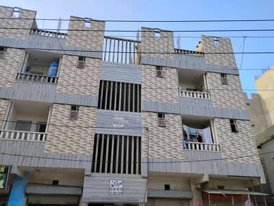 Shop and Flats available for sale new building kda employees korangi