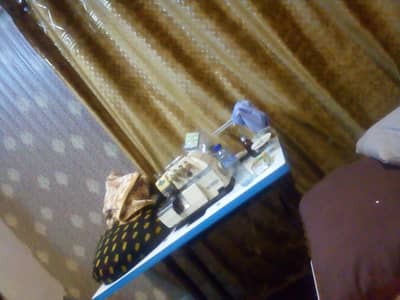 over lock machine bilkul saf condition price 27k