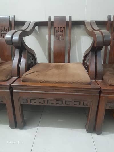 full solid wood chairs  and centre table with glass and wood material