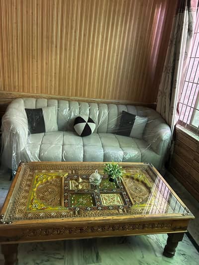 5 seater sofa with antique swati center table
