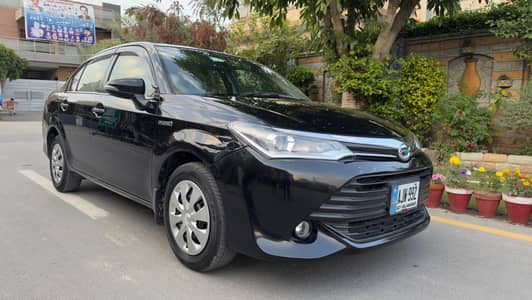 Toyota Corolla 1.5 AXiO  Hybrid Ev  ( full options)