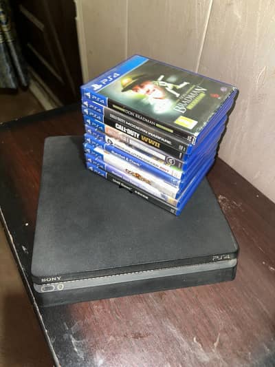 Play station 4 slim , 500 gb , with original new games