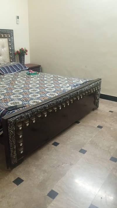 Double bed with side tables