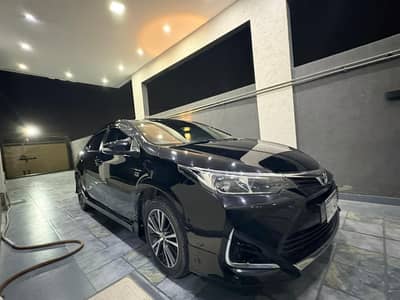 Black Toyota Corolla for sale. Only 35000km driven.  carefully maint. .