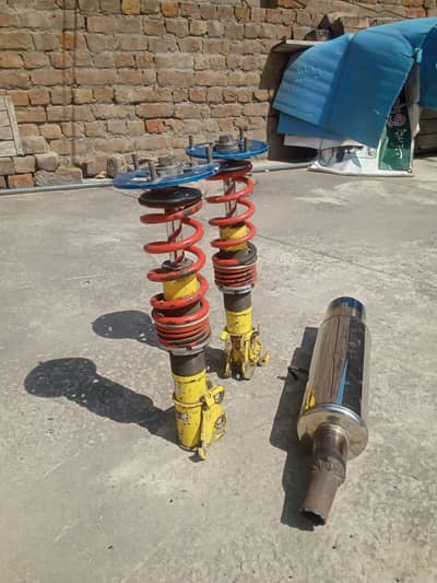 Sports car shocks and silencer