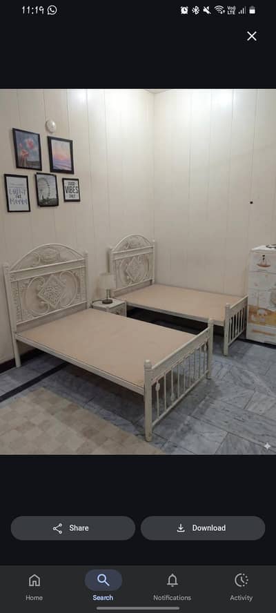 Pair of Ornate Iron Beds