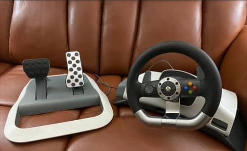 Xbox 360 Wireless Racing Wheel.