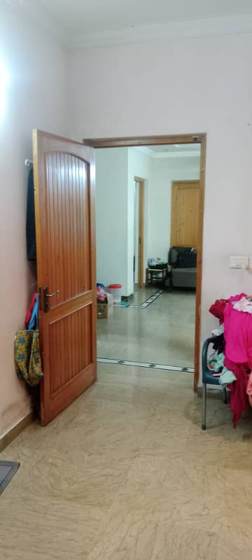 10 Marla tiles floor beautiful uper portion lower lock option available for rent at wapda town j2 block