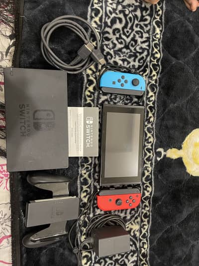 Nintendo switch with complete accessories