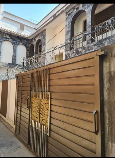 Double store house available for Sale in abott road link Nasir road city area