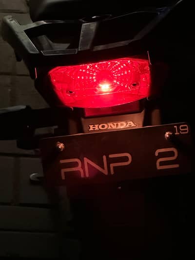 unique Number hai bike ka with silencer and handle