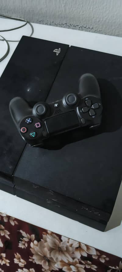 PS4 WITH FOUR GAME