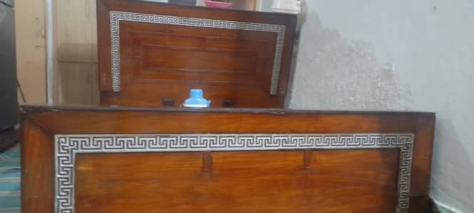 Double wooden bed for sale