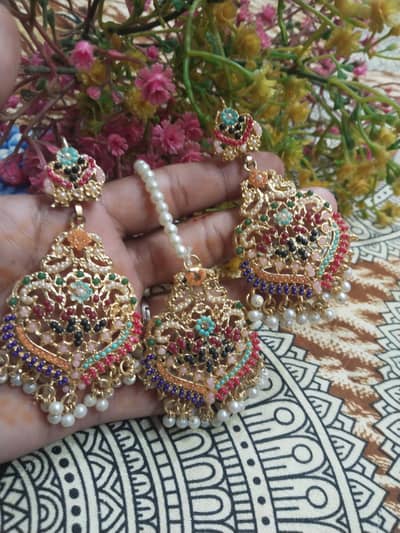 eyer ring's and matha tika