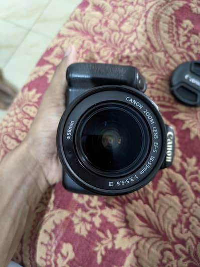 . Canon 1200D