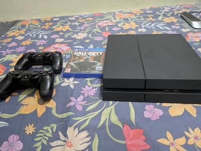 play station 4 fat model 500gb with 12 months Ps plus pass