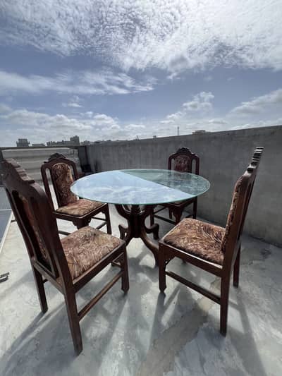Wooden dining table with 4 chairs