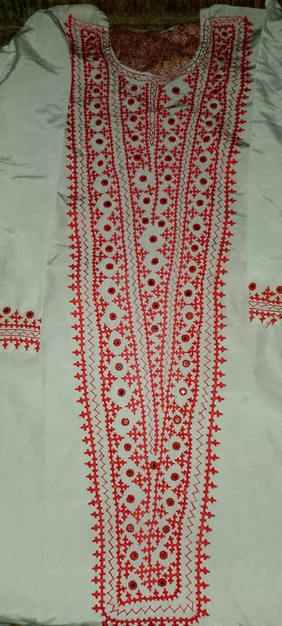 women handwork karahi with mirror stitches suit .