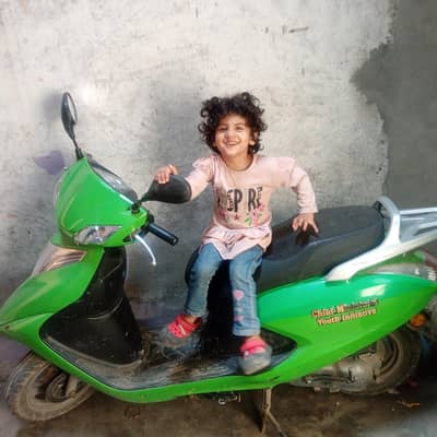 CM Punjab Scheme green Scooty united 100 petrol