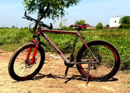 “Mazera MTB Bicycle – Like New | Disk Brakes | Stylish Red & Black