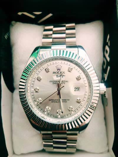 Silver Rolex Day-Date (Oyster Perpetual Day-Date) Watch.
