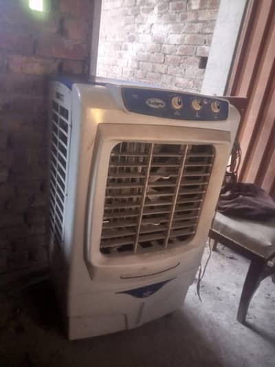 A one room air cooler two season used all okay