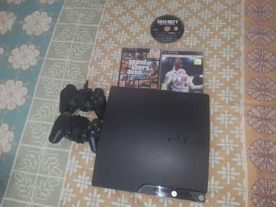 PS3 slim with 3 cd  10/10 good condition all good 2 month use made uk