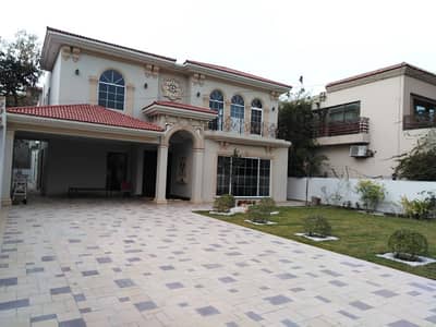 10 Marla Lash Green Lawn + One Kanal Brand New Spanish Design Most Beautiful Bungalow 2 Servant Quarter In Basement For Sale At Prime Location Of DHA Lahore Near To Park Masjid & Commercial Market