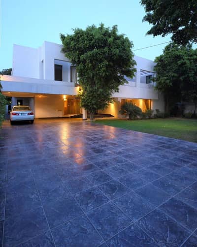 2 Kanal Well Maintained Modern Design 10-Bedroom Full Basement Triple Unit Bungalow For Sale at Prime Location of DHA Lahore Near to Park Masjid & Commercial Market.