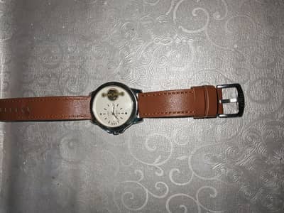 Timass watch neww with box and in built moving mechanical dial.