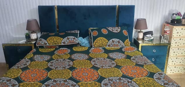 Bed with side tables and dressing