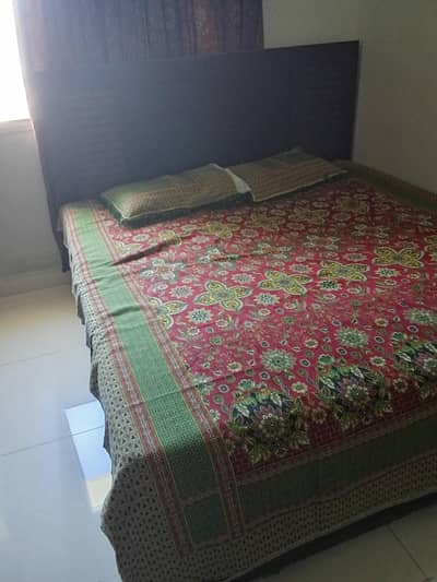 Wooden queen size bed