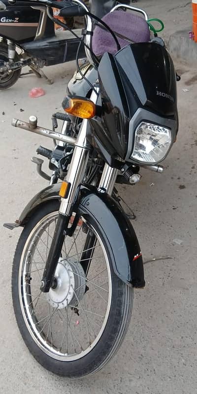 Honda 70 dream one hand use