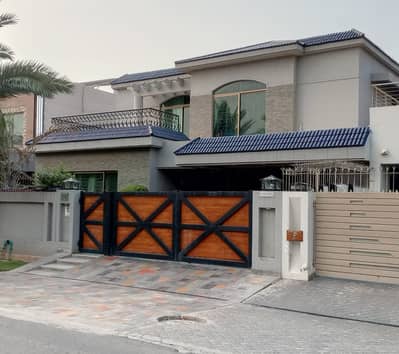 One Kanal Slightly Used Spanish Design Owner Build Well Maintained Bungalow For Sale At Prime Location Of DHA Lahore Near To Park Masjid & Commercial Market.