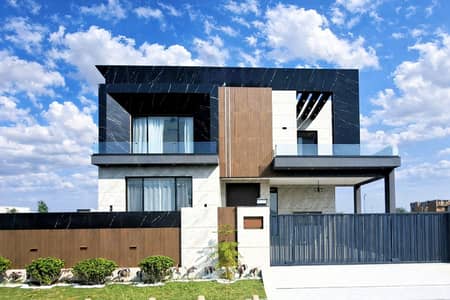 One Kanal Brand New Luxury Ultra-Modern Design Most Beautiful Bungalow 2 Servant Quarter In Basement For Sale At Prime Location Of DHA Lahore Near To Park Masjid & Commercial Market.