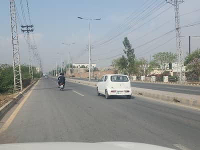 68 kanal land fot town house socity located near Indus Hospital