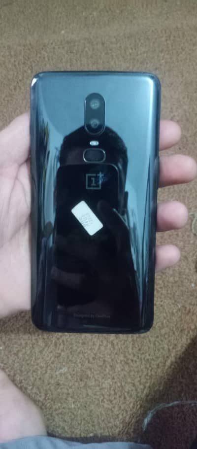 one plus 6 official PTA  8RAM 128 GB Storage  0.3. 4.3=6.6. 5.4. 9.3. 3